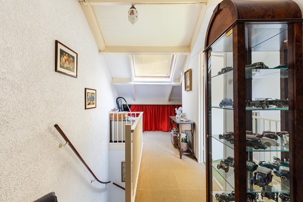 Foto - Te koop: Goed onderhouden tussenwoning in rustige woonwijk!